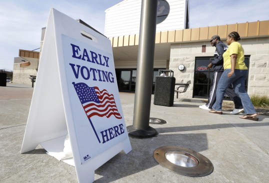 Voters arrive to cast early ballots in Davenport, Iowa. (Charlie Neibergall, AP)